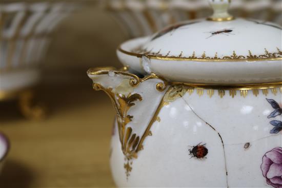 A 19th century Meissen jug and cover, cracked, 12.5cm., a Berlin gilt porcelain basket, another similar basket